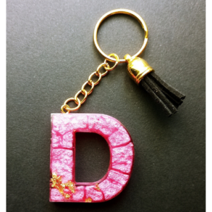 Atslēgu Piekariņš "D" - rozā